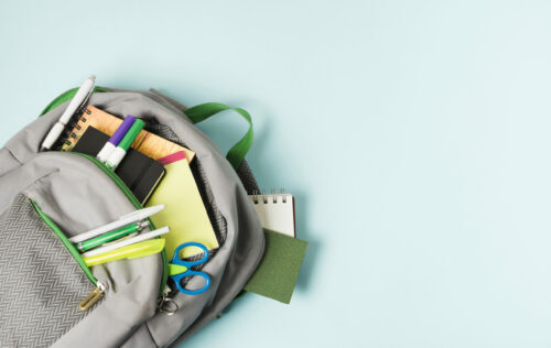 opened-backpack-with-school-supplies