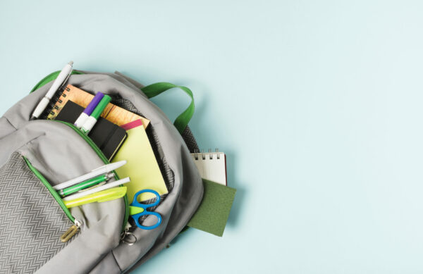 opened-backpack-with-school-supplies