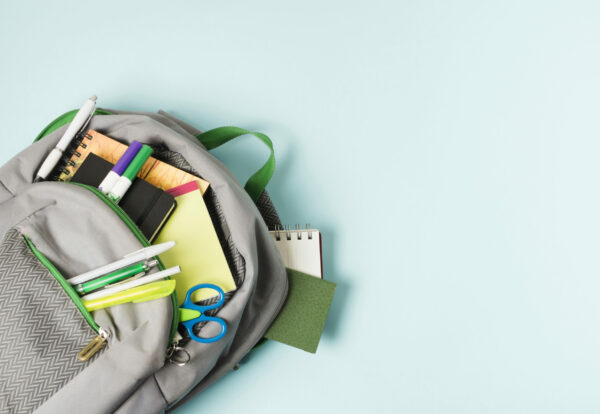 opened-backpack-with-school-supplies